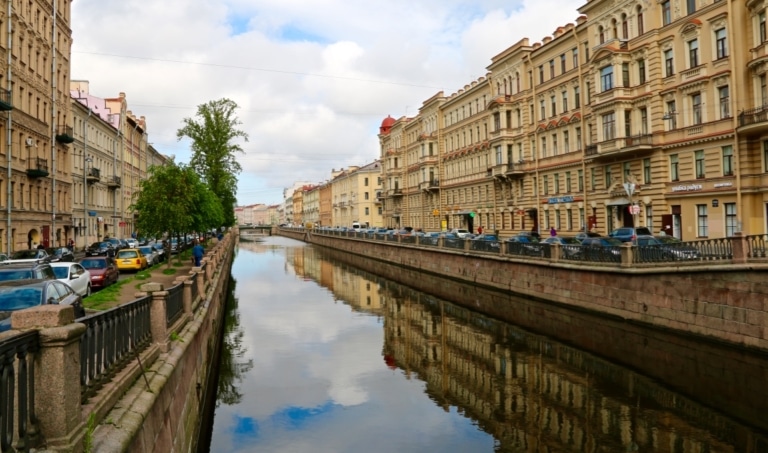 A canal lined with historic buildings in St. Petersburg, Russia.