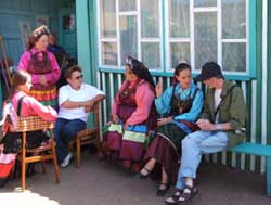 Charles Braver (seated far right) talks with a group of Old Believers in Siberia