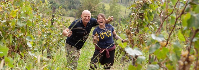Rikki Brown (right) helping with the grape harvest (rtveli) in Imereti.