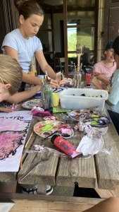 Painting with some girls at the Swiss summer camp