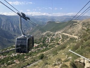 the Wings of Tatev cable car soaring above the rugged mountains and deep gorge of the Vorotan River in the Syunik Province of southern Armenia.
