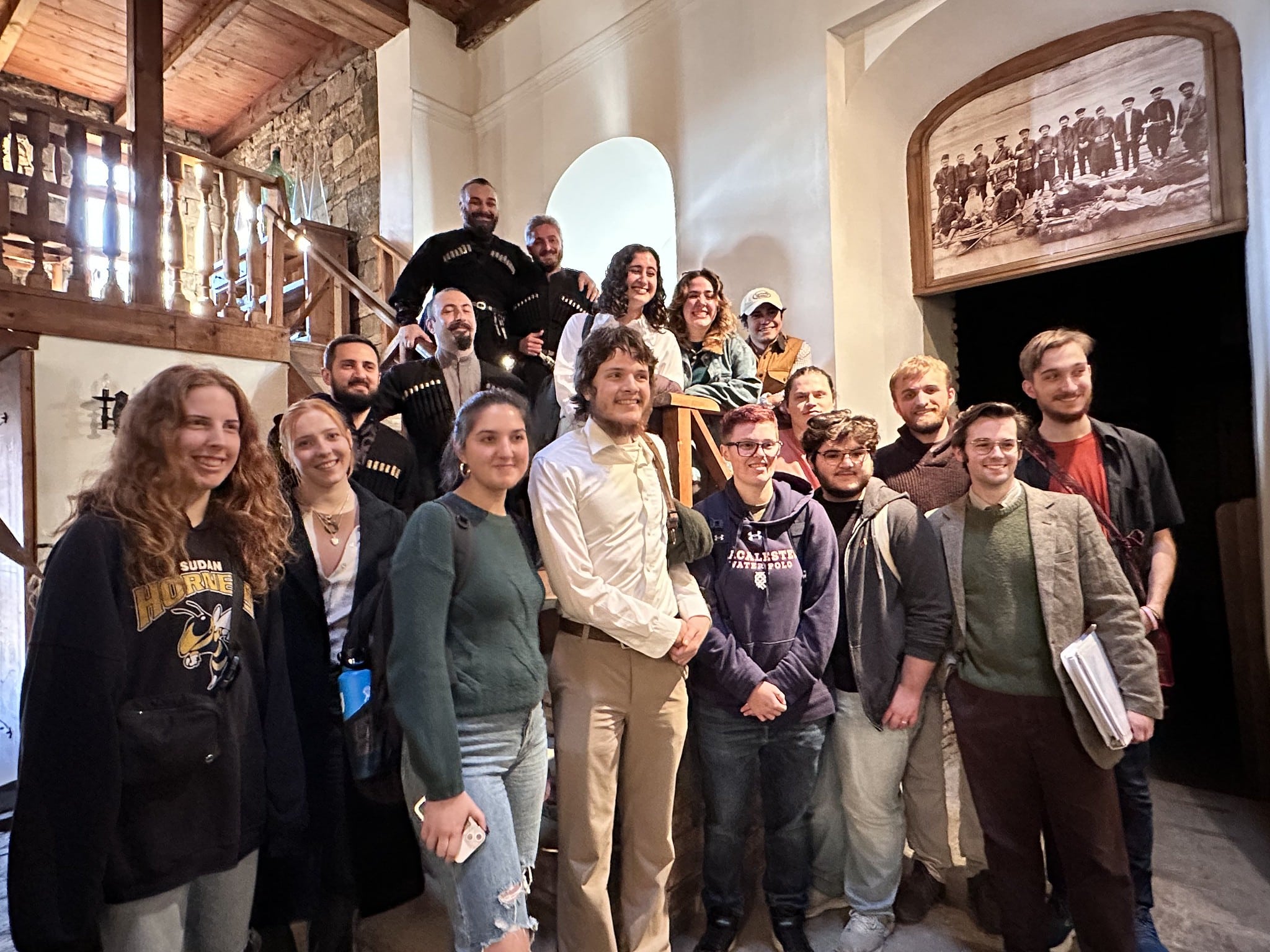 Students attending a workshop with professional Georgian folk singers.