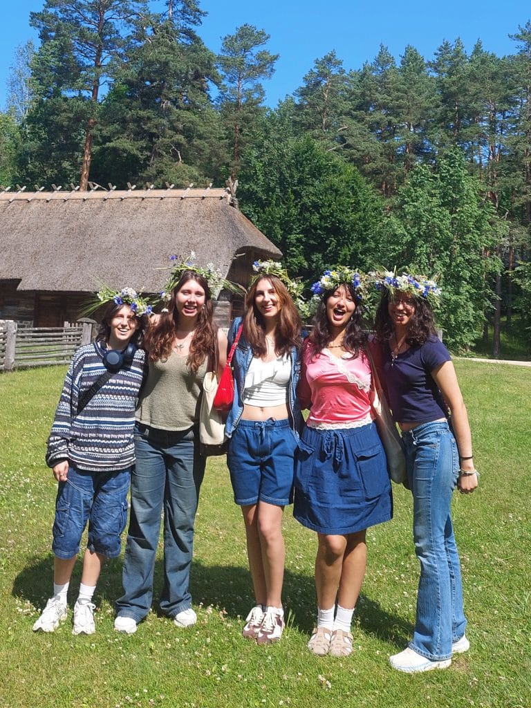 Students at the Open Air Museum in Latvia, with traditional flowered head wreaths.
