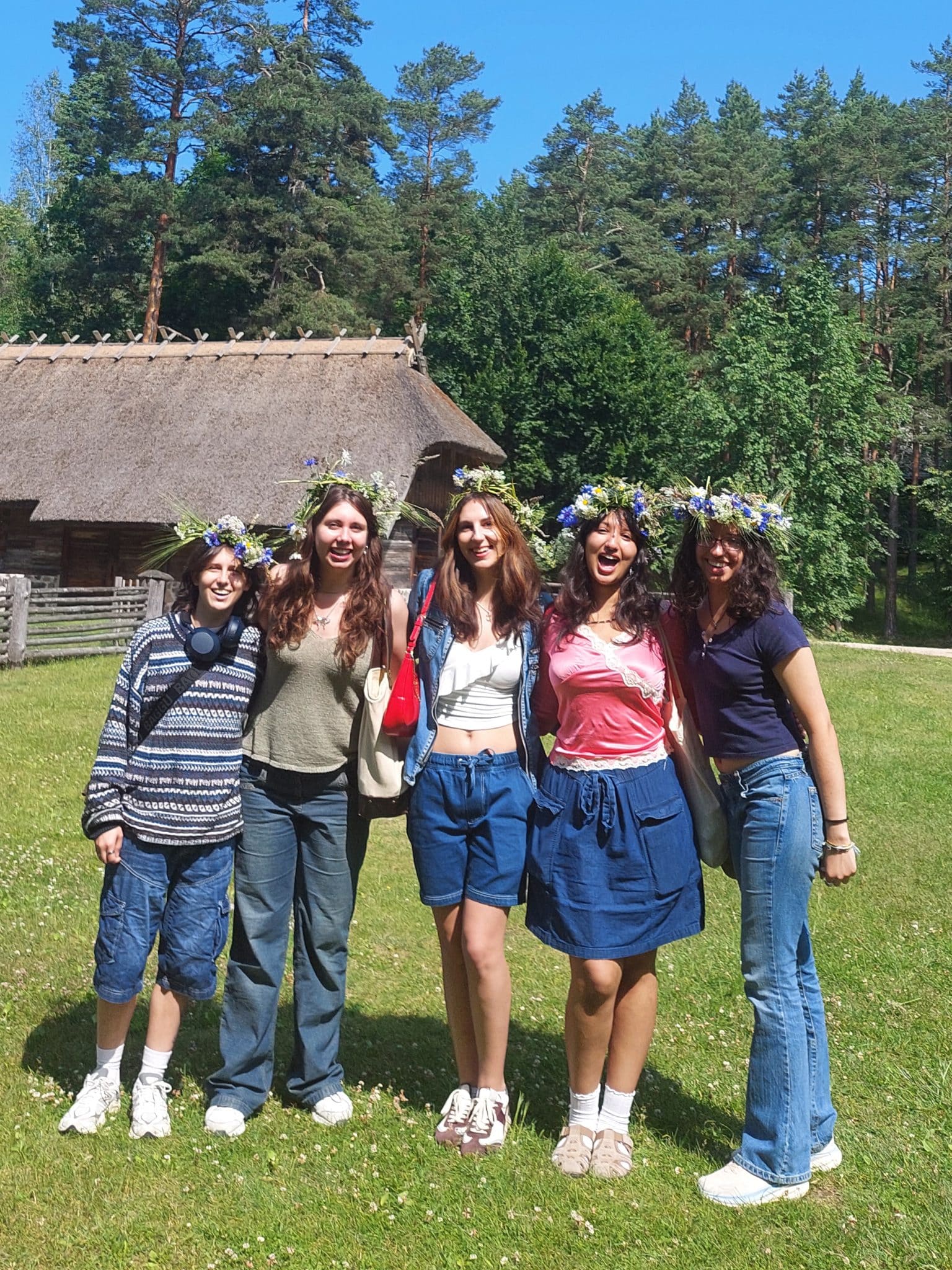 Students at the Open Air Museum in Latvia, with traditional flowered head wreaths.