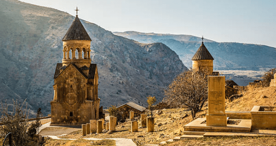 Noravank Monastery at sunset, complex is located in the mountains of Vayots Dzor province, Armenia