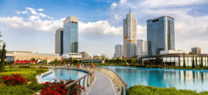 the modern skyline and park area of Tashkent City Park in Tashkent, Uzbekistan.