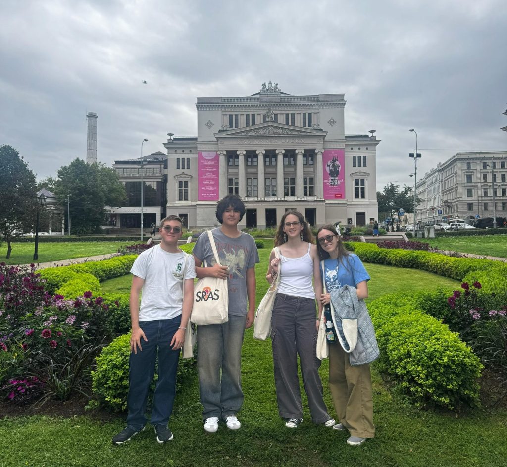 Latvian for Youth students in front of the building Latvian National Opera in Riga, Latvia.
