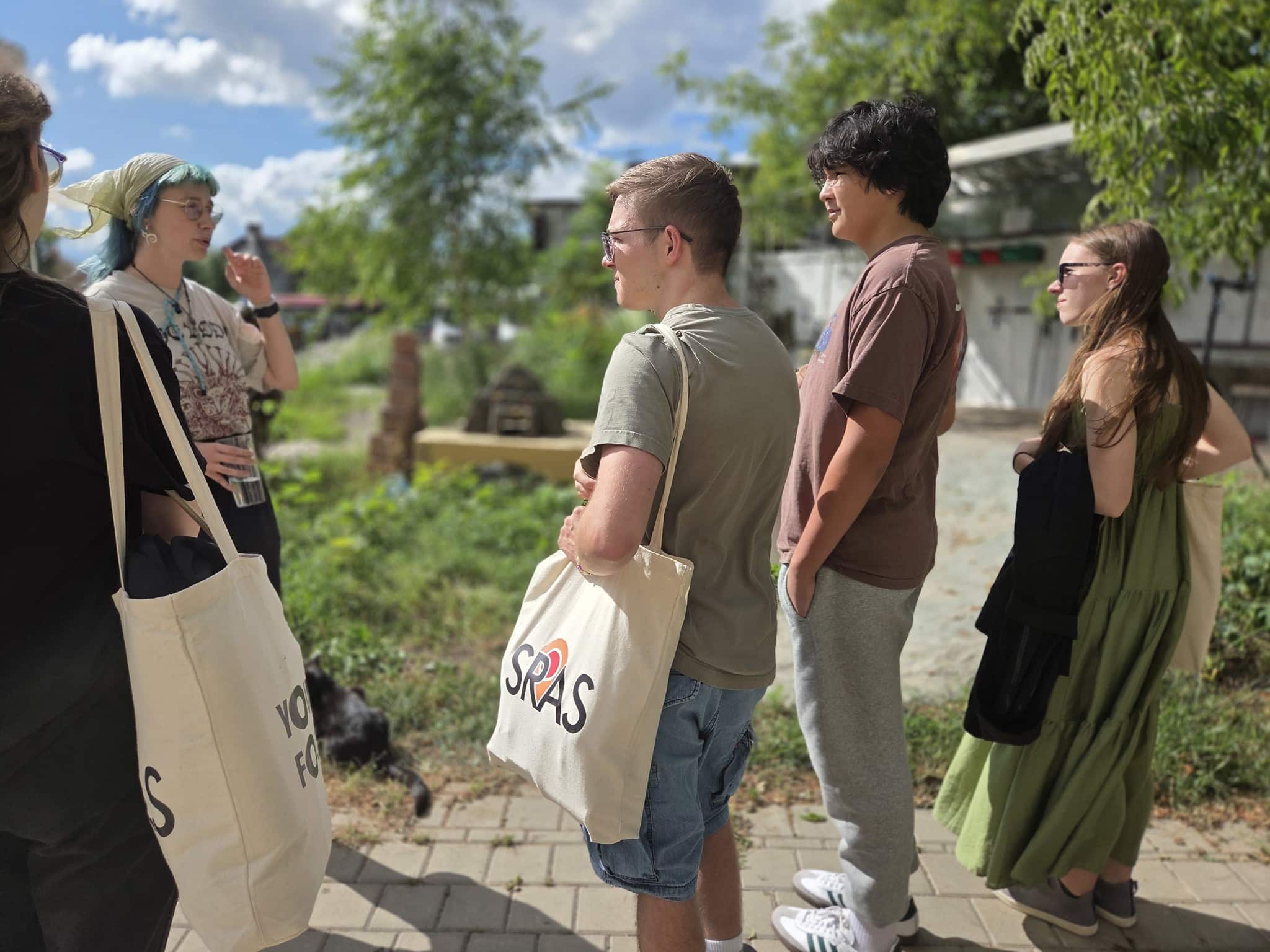 Students listening to a guide.