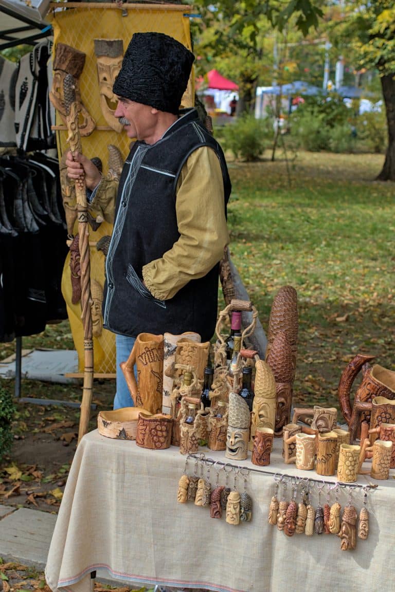A Moldovan man selling traditional local crafts.