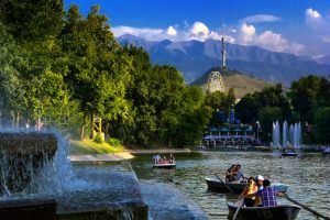People boating in Central City Park, Almaty, Kazakhstan.