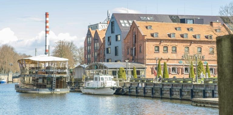 Small passenger boats docked in Klaipėda.
